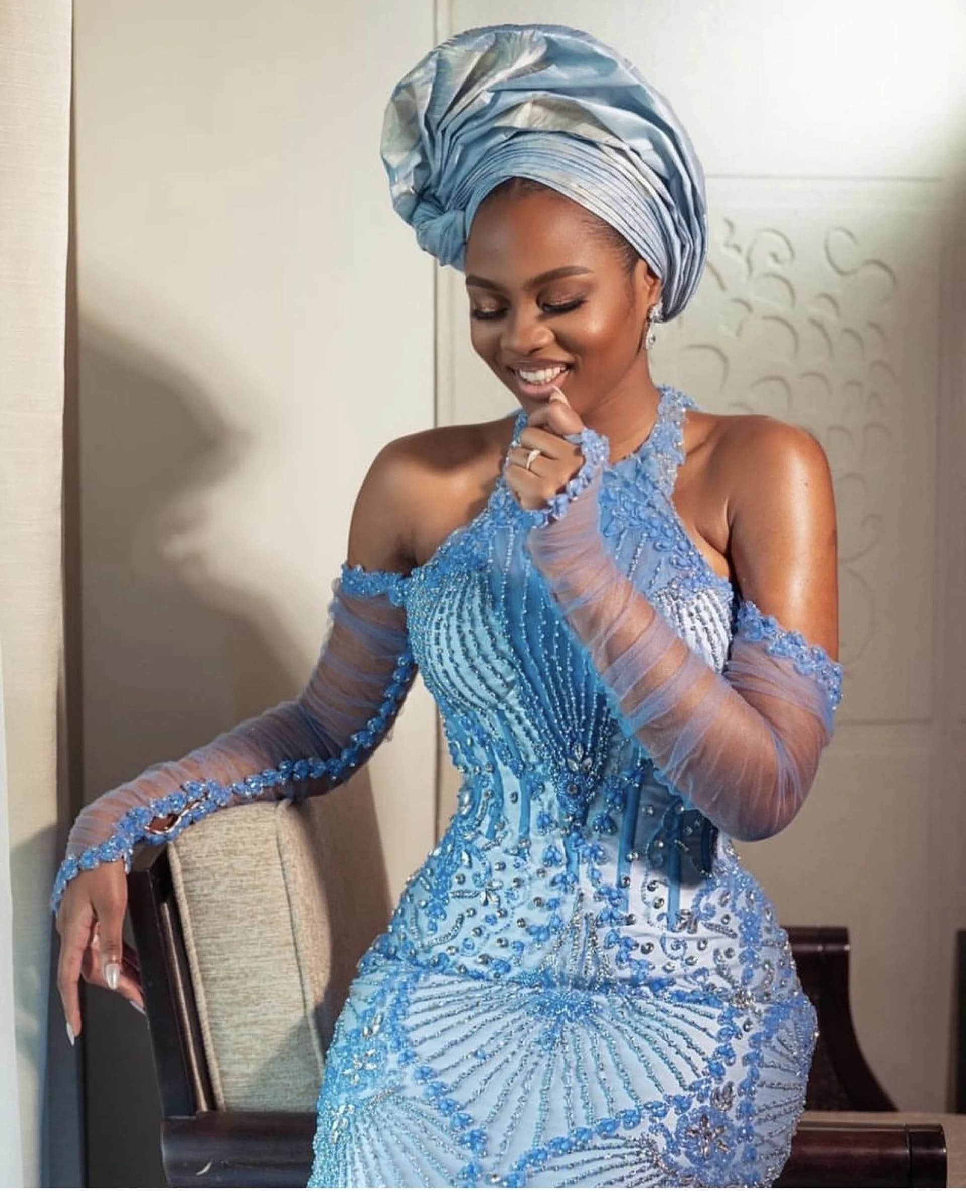 Model wearing a sculpted evening gown